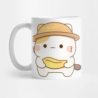 muffin cat holding banana Mug